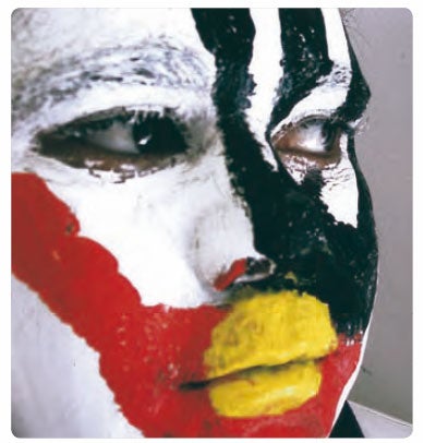Aboriginal girl with painted face. (c) Luke Urquhart