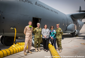 Sex Discrimination Commissioner Kate Jenkins in front of a RAAF jet