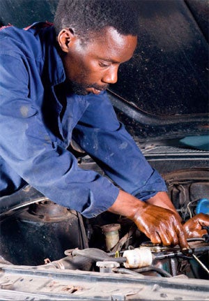 African Australian Mechanic. (c) Michael Jung
