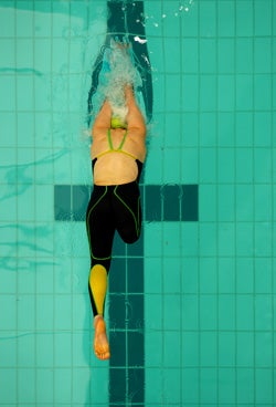 Disabled athlete swimming