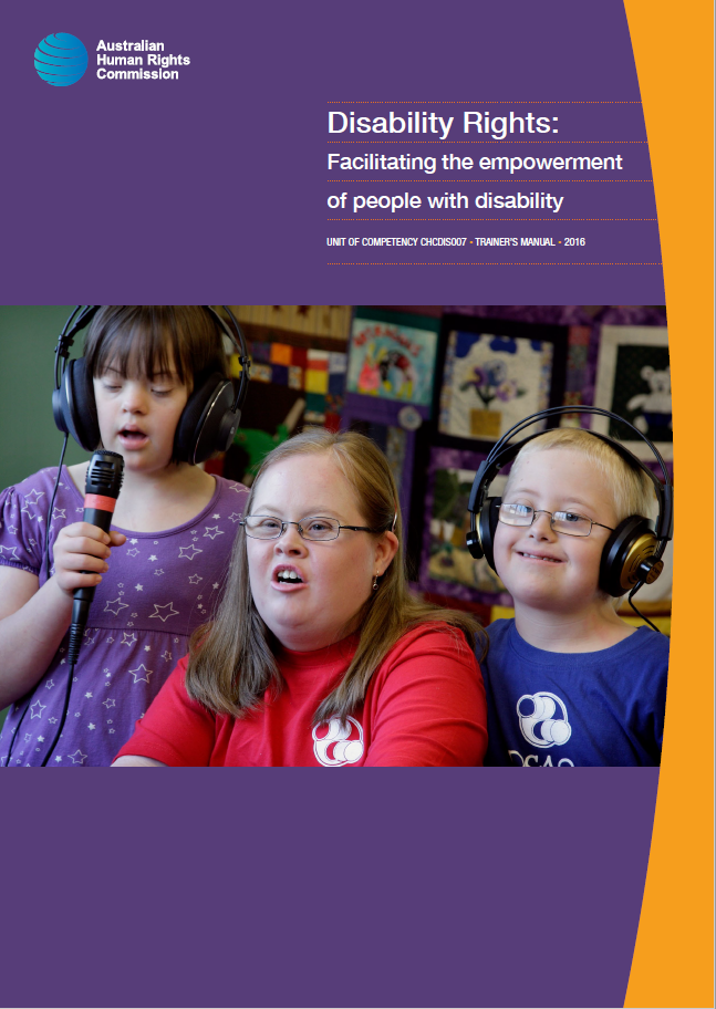 Three smiling children. Two are wearing headphones. One is speaking into a microphone.