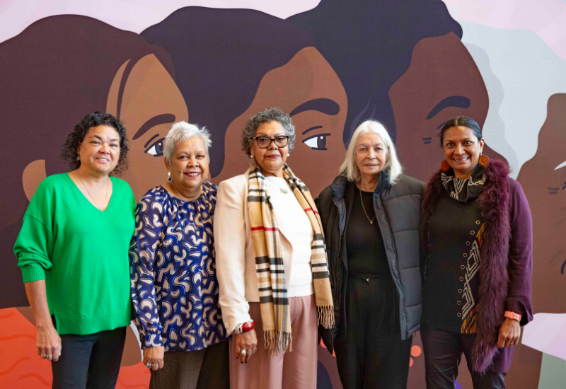 Aboriginal and Torres Strait Islander Social Justice Commissioner June Oscar AO standing next to four other people at the Wiyi Yani U Thangani National Summit